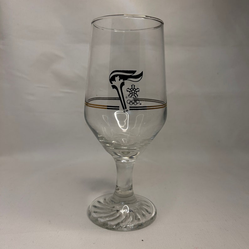 SET OF 4, 1988 Calgary Winter Olympics Torch Relay Gold Trimmed Glasses