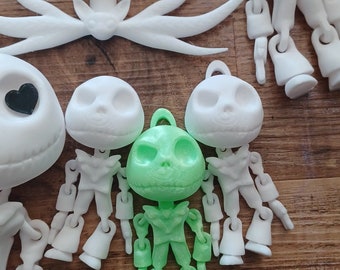 May include: A set of 3D printed Jack Skellington figures. The figures are articulated and come in white and green. The figures are posed in a variety of positions.