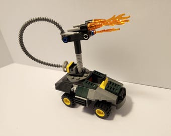 Auténtico set LEGO #76008 Iron Man vs El Mandarín Vehículo. No incluye figuras. Faltan algunas piezas. Estado regular.