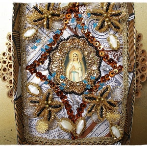 Wall art: image of Mary of Lourdes, monastery work Holy Virgin Mary in a decorated box with wirework and ornaments, religious decoration