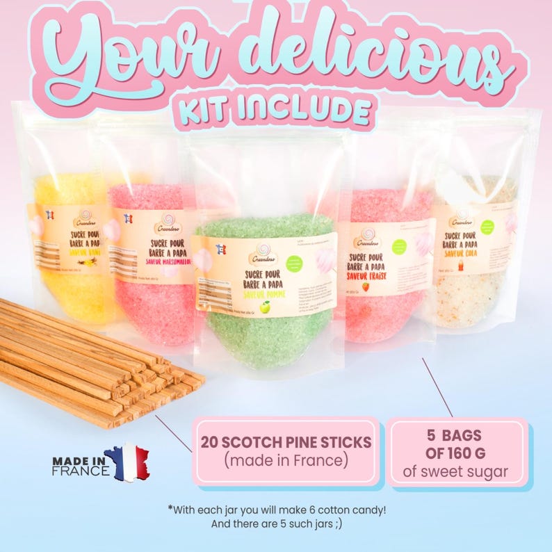 May include: A cotton candy kit includes five bags of colored sugar, each weighing 160 grams, and 20 Scotch pine sticks. The kit features yellow, pink, green, and white sugar, with text in French. The packaging is clear plastic.