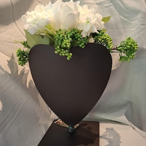 Metal heart with silk flower arrangement
