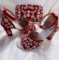 Red Bridal Heels & Clutch: Hand Embroidered Wedding Footwear product logo