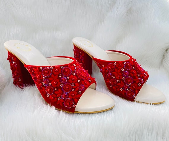 Red embroidered best sale heels
