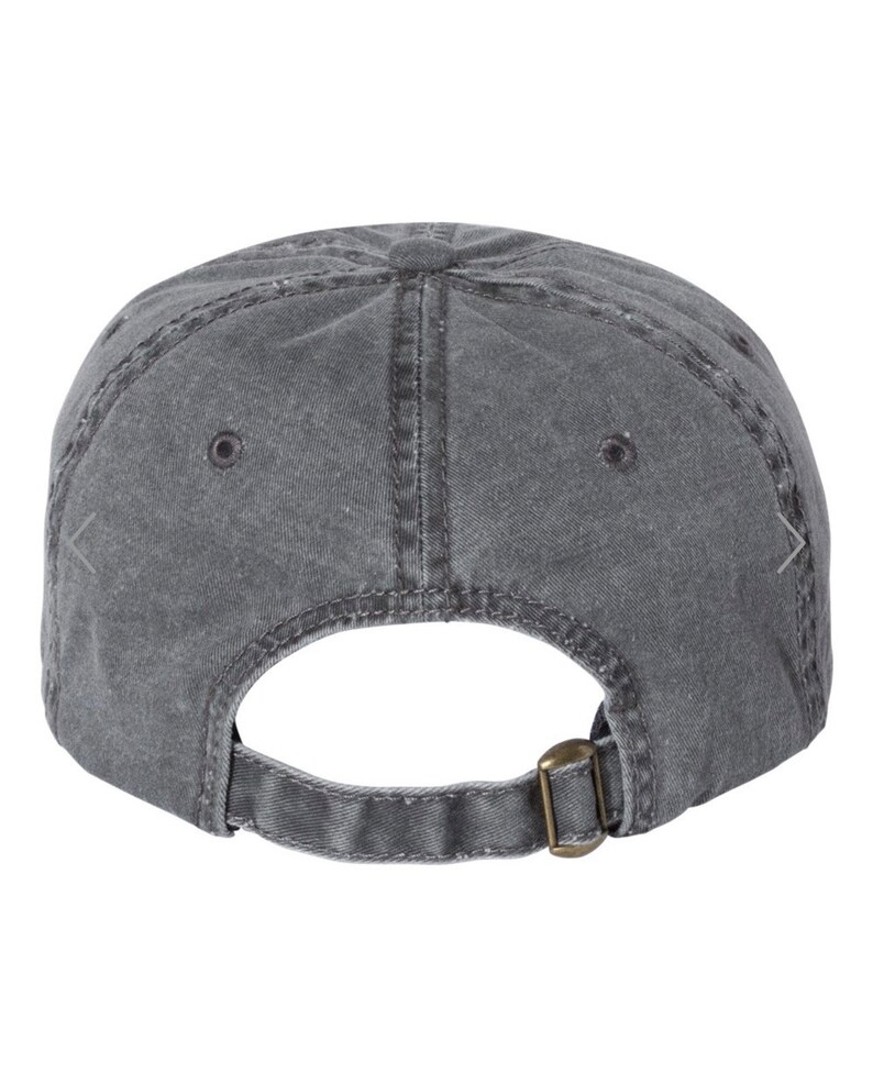 May include: A gray, washed cotton baseball cap with a brown adjustable buckle closure.