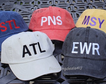Gorra bordada personalizada con código de aeropuerto y código de área de ciudad.