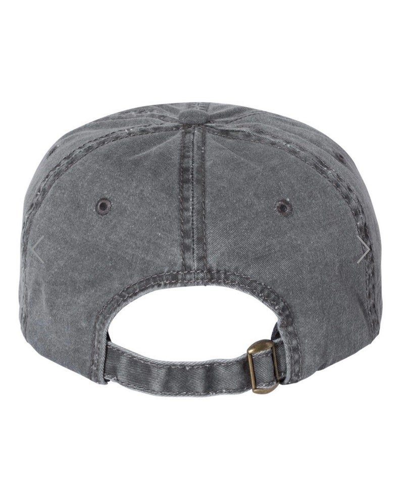 May include: A gray, washed cotton baseball cap with a brown adjustable buckle closure.