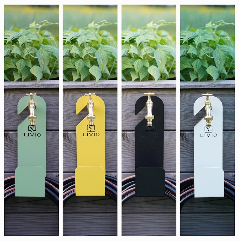 May include: Four hose holders in green, yellow, black, and white, each with a brass faucet design and the "LIVIO" logo. The holders are mounted on a wooden fence with a garden backdrop and a coiled hose at the bottom.