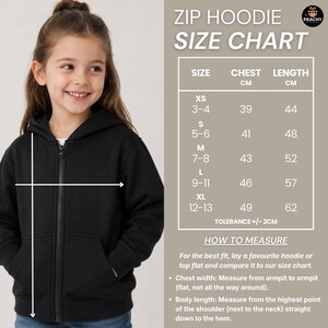 May include: A black zip-up hoodie size chart featuring a table with columns for size, chest in cm, and length in cm. The chart lists sizes XS through XL with corresponding measurements and instructions on how to measure chest width and body length.