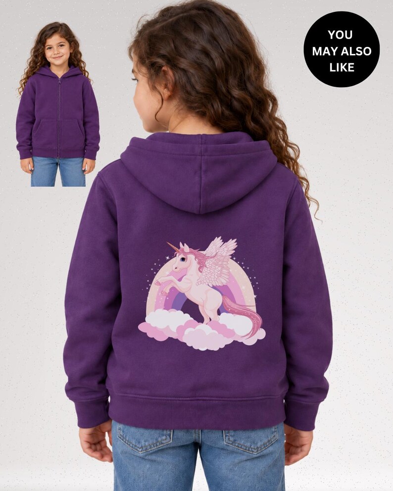 May include: A purple zip-up hoodie featuring a graphic on the back of a white winged unicorn standing on pink clouds in front of a rainbow. A smaller inset image shows the front of the same purple hoodie. The text YOU MAY ALSO LIKE is visible.