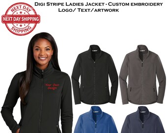May include: A black, gray, blue, and navy blue zip-up jacket with a stand-up collar. The jacket has two front pockets and a zipper closure. The jacket is shown on a model with the text "Your Own Design" embroidered on the front.