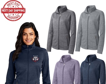 May include: Four women's fleece jackets in different colors: heather gray, navy blue, purple, and dark blue. The jackets have a zipper closure, two front pockets, and a stand-up collar. One jacket has the text "Savannah RN" embroidered on the left chest.