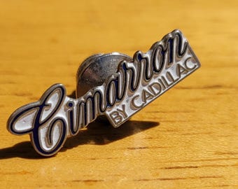 Vintage 1980s Cadillac Cimarron Pin Cimarron By Cadillac preowned in awesome condition 1", ultra rare.