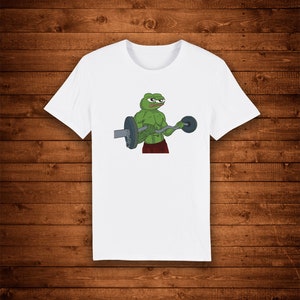 Pepe la grenouille se fait déchirer en soulevant des t-shirts pour une salle de sport, design unique, art de rue, t-shirts graphiques urbains, haut