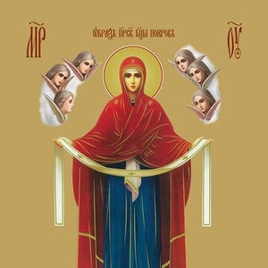 May include: A religious icon depicting the Virgin Mary in a blue and red robe, holding a scroll. The icon is surrounded by a golden background and angels with wings.