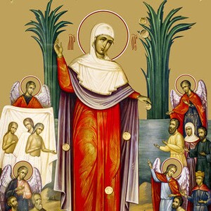 May include: A religious icon depicting a woman in a red and white robe with a halo. She is surrounded by angels and the text "ОБРАЗИ СКОРБЛІЦІА ПРСЕ БІЦЫ" is at the top of the image.
