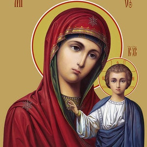 May include: An icon depicting the Virgin Mary holding a young Jesus Christ. The icon is painted in a traditional style with vibrant colors. The Virgin Mary is wearing a red robe and a blue veil. Jesus is wearing a white robe and a blue cloak. The icon is framed in a gold frame.