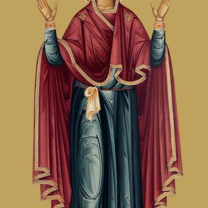 May include: A religious icon depicting a woman in a red and blue robe with her hands raised in prayer. The icon has a gold background and the text "ΜΡ ΘΥ" and "ΙΕΡΩΝΥΜΑ ΘΕΙΑ" in black.