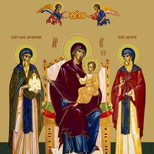 May include: An icon depicting the Virgin Mary and Child, with two angels above and two saints flanking the throne. The Virgin Mary is wearing a blue and red robe, and the Child is wearing a yellow robe. The saints are wearing robes in shades of blue and red. The icon is set against a gold background.
