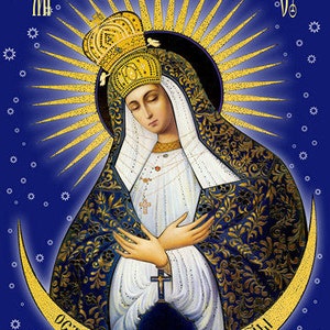 May include: A religious icon depicting the Virgin Mary in a blue and gold robe with a crown on her head. The icon is set against a blue background with stars and a crescent moon. The text "Остробрамская Прэтля Боги" is written in gold at the bottom of the icon.