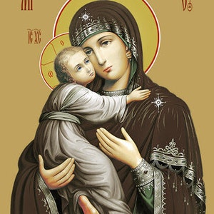May include: A religious icon depicting the Virgin Mary holding the baby Jesus. The icon is painted in a traditional style with gold accents and a brown background. The text "MP OY" is written in the top corners of the icon.