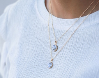 Genuine forget-me-not pendant mounted on an adjustable gold-plated chain