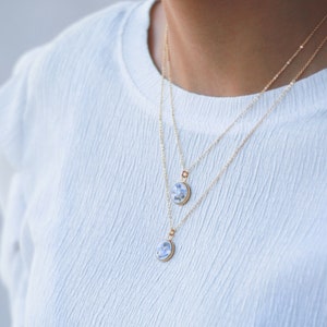 Real forget-me-not pendant mounted on an adjustable gold-plated chain