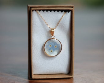 Real forget-me-not necklace mounted on an adjustable gold-plated chain