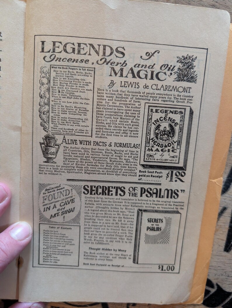 May include: A vintage book page featuring advertisements for two books: Legends of Incense, Herb and Oil Magic by Lewis de Claremont and Secrets of the Psalms. The page contains black text on a cream background with illustrations of book covers.