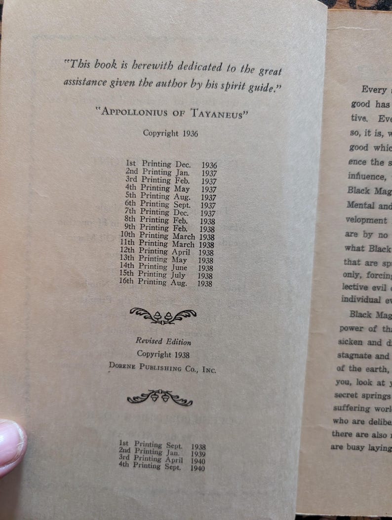 May include: A page from a vintage book featuring a dedication to a spirit guide, the name Appollonius of Tayaneus, and a detailed list of printing dates from 1936 to 1940. The text is printed in black ink on aged, light tan paper with decorative flourishes.