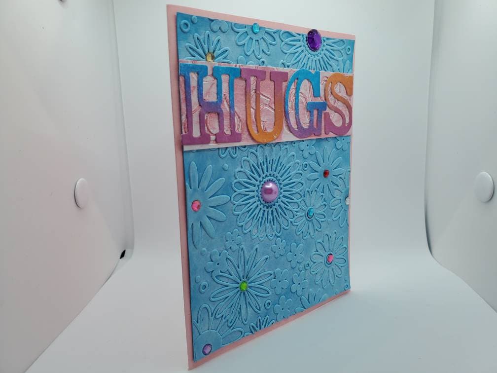 Hugs greeting card handmade just because card embossed blue with embellishments