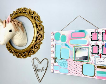 Vision board kit, pre-assembled comes with a 16 x 20 inch hand painted canvas.