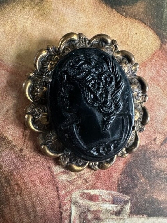 Brass Setting with Black Celluloid Cameo Brooch, B