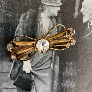 1940s Gold Tone Bow Brooch with Clear Rhinestones Vintage Crystal Pin Mid Century Jewelry Gift
