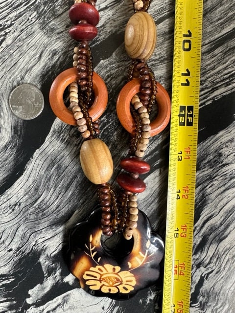 70s Wood Bead With Faux Bone Stenciled Pendant, 70s 70s Wood Bead With Faux Bone Stenciled Pendant, 70s