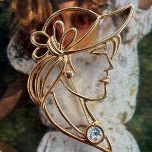 1980s Tona Signed Gold Tone Wire Lady Brooch Vintage Rhinestone Hat Figural Woman Face Pin Statement Jewelry