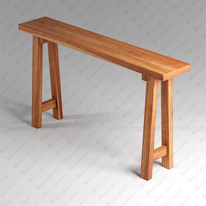 May include: A tall, narrow console table crafted from light brown wood with a smooth, rectangular top surface. The table features four angled legs that flare outward toward the base, connected by horizontal support bars on each side for stability.
