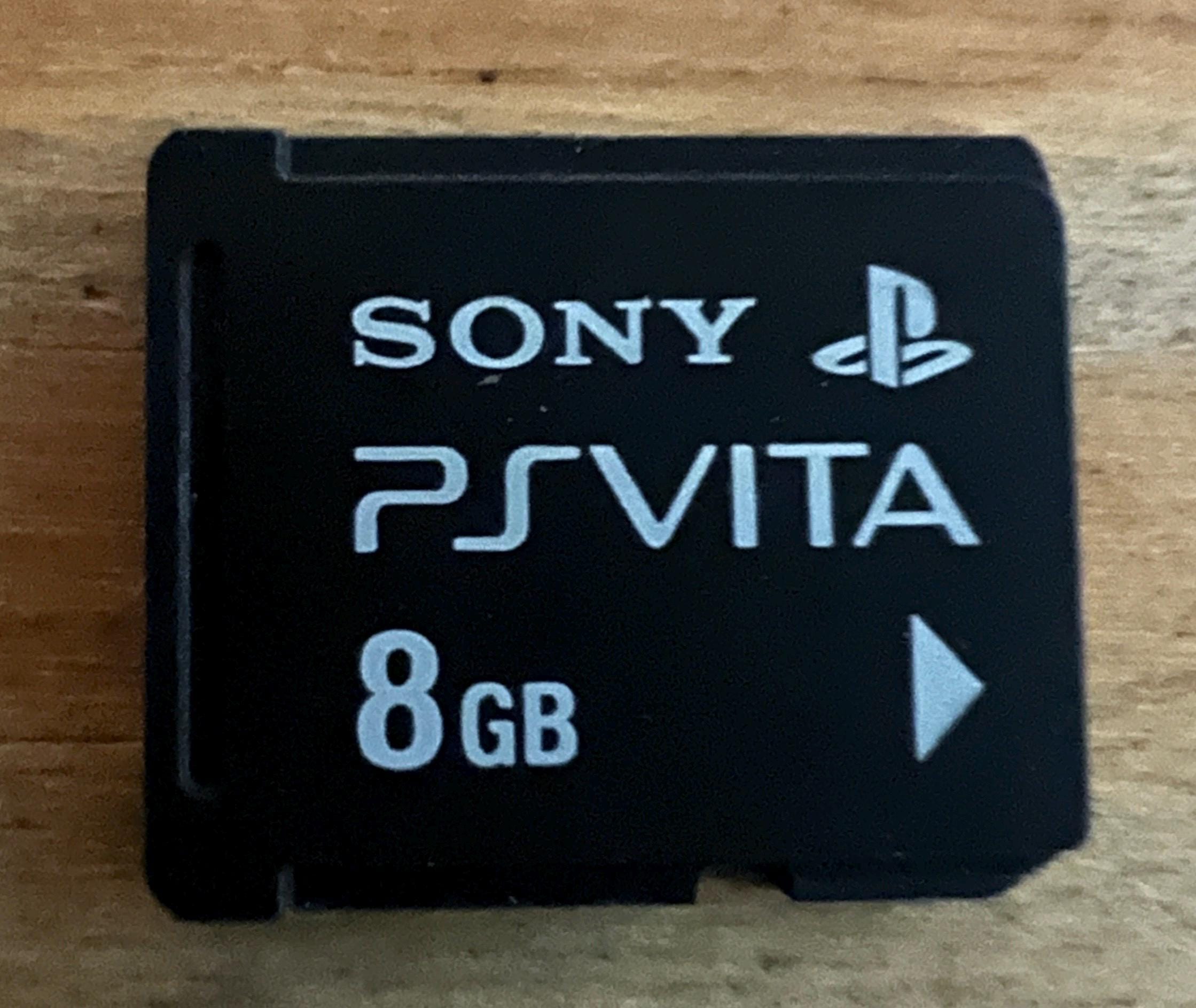 Sony PS Vita 1000 OLED - Black - Good Condition + 8GB Sony Memory