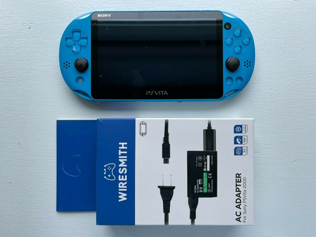 Sony PS Vita PCH-2000 Aqua Blue Handheld (Region Free) With 3 Bonus Games & USB Cable