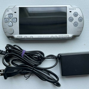 Sony PSP-2000 Console 100% Authentic, WiFi enabled Good Condition Comes with Charger New Battery Tested, Cleaned & Working image 4