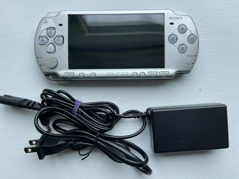 Sony PSP-2000 Console 100% Authentic, WiFi enabled Good Condition Comes with Charger New Battery Tested, Cleaned & Working image 4