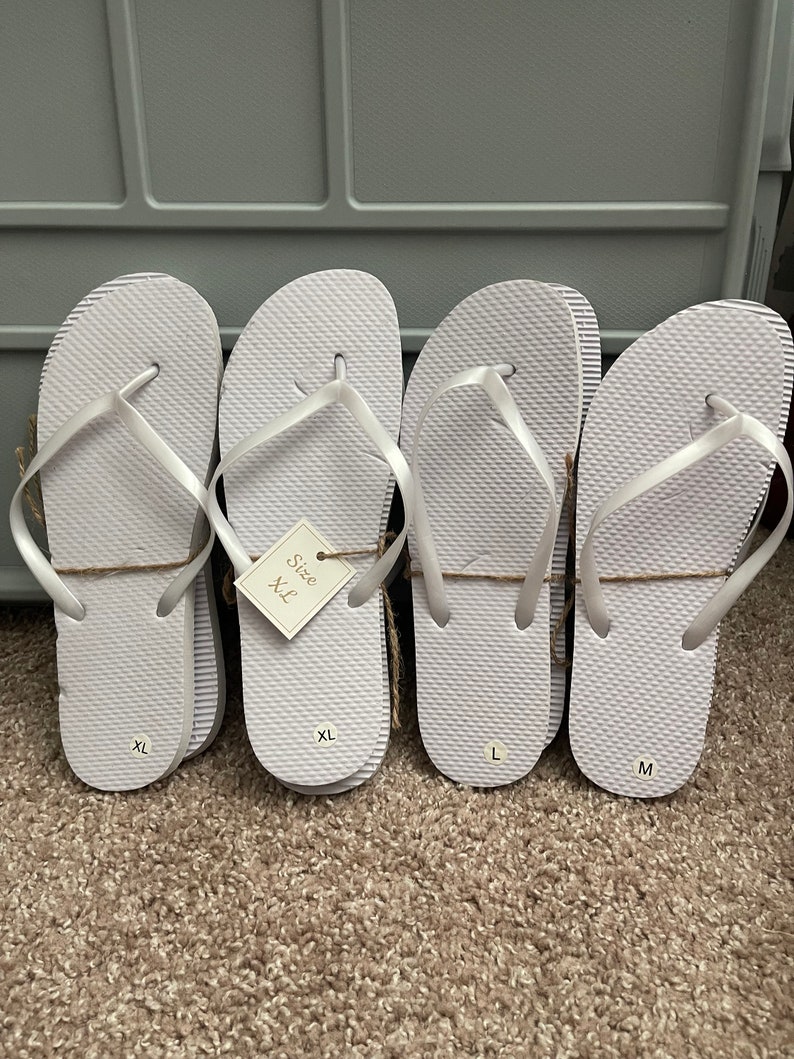 Bulk white flip flops with bags. Sizes small through X-Large. PACK of 24 pairs for listing price. image 2