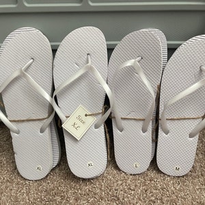 Bulk white flip flops with bags. Sizes small through X-Large. PACK of 24 pairs for listing price. image 3