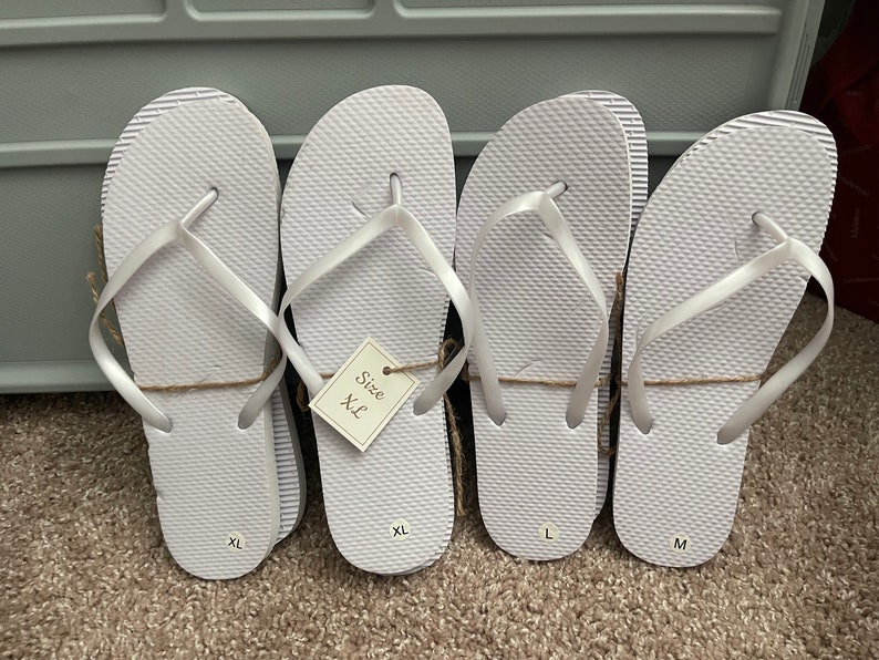 Bulk white flip flops with bags. Sizes small through X-Large. PACK of 24 pairs for listing price. image 3