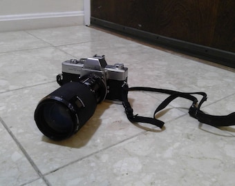 ミノルタ フィルムカメラ（望遠レンズとバッテリー付き） - Etsy 日本