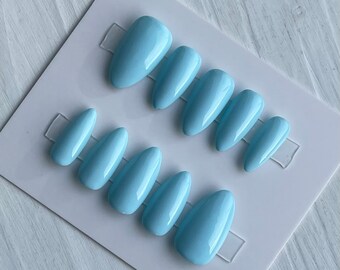 Short Almond Press on Nails in a light blue and ready to ship