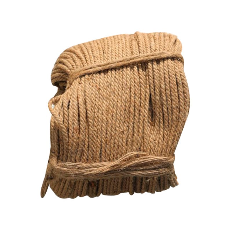 May include: A tightly wound coil of natural brown jute rope.