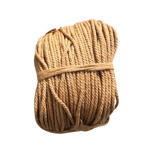 May include: A tightly wound coil of natural brown rope. The rope is made of a natural fiber and is perfect for crafting, gardening, or nautical projects.