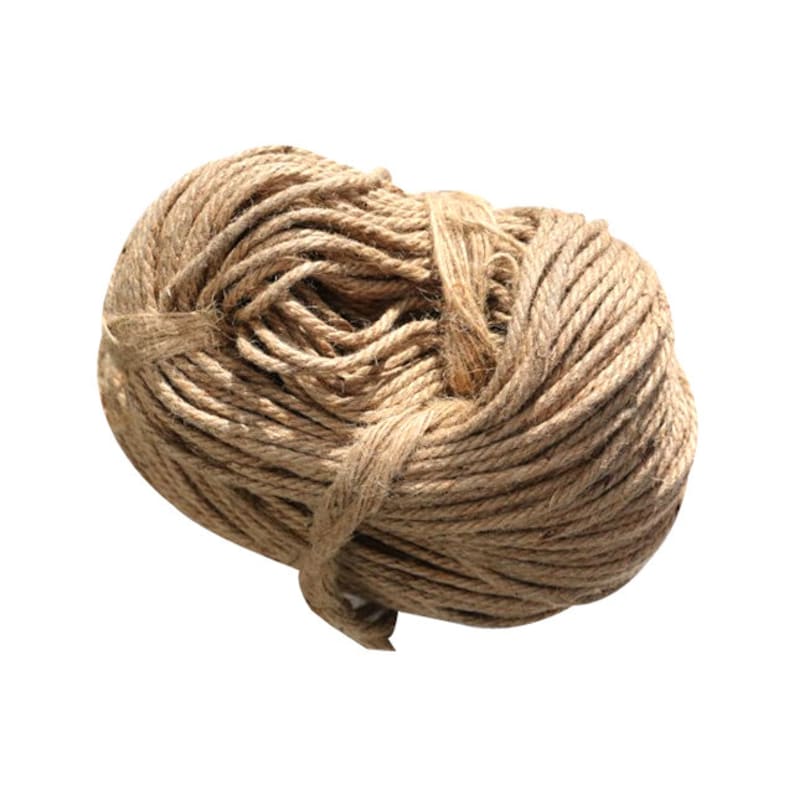 May include: A close-up of a ball of natural brown twine or rope. The twine is tightly wound and has a rough texture.
