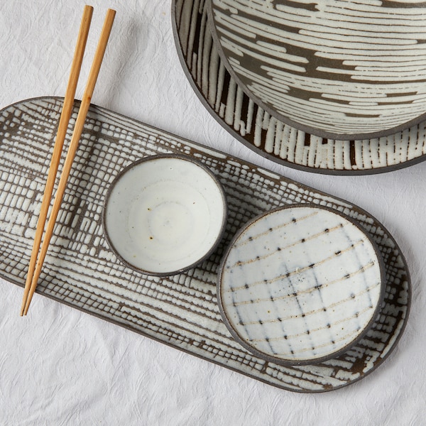 Japanese sushi dinner | Oval platters | Black and white ceramic tray with pattern
